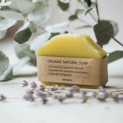 Natural handmade soap arranged on table with Eucalyptus twigs