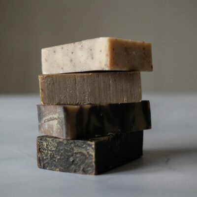 Stack of natural soaps placed on table