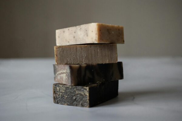 Stack of natural soaps placed on table